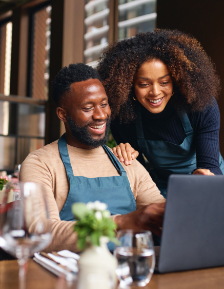 Business owners reviewing their follow-up system