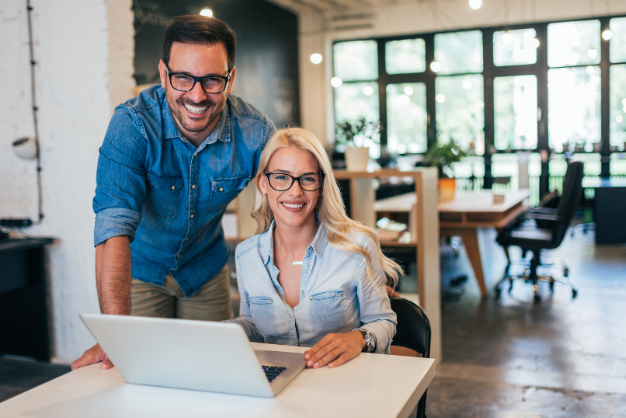 A couple of business owners are having a conversation about their marketing budgets