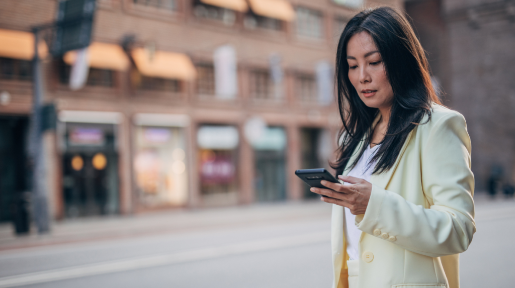 Customer receiving a promotional text message from a nail business